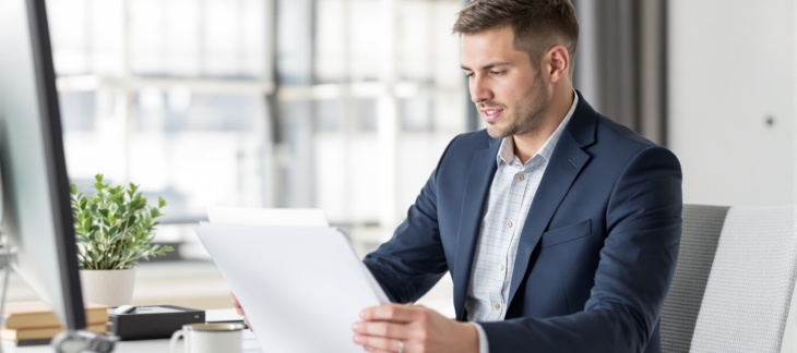 Finance professional reviewing overdue invoices and accounts receivable workflow for Commercial Debt Collection for Australian Businesses